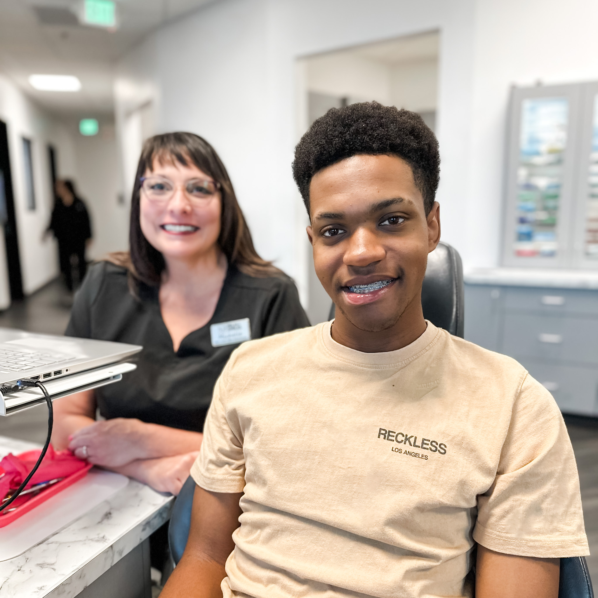 smiling patient on a dental chair